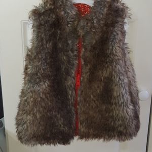 Baby girl furr vest. Reversible